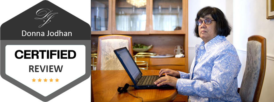 Donna Jodhan Certified Review Badge. Photo of Review Badge to the left reads Donna Jodhan Certified Review. Photo of Donna Jodhan to the right sitting at a large wooden table typing into her laptop. This badge certifies that this is an original and genuine review provided by Award Winning Sight Loss Coach, Advocate and Author Donna Jodhan.