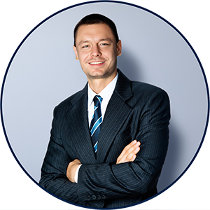 Aaron Di Blasi, President and Sr. Project Management Professional, Mind Vault Solutions, Ltd., PR Director: AT-Newswire, Publisher: AI-Weekly, Top Tech Tidbits, Access Information News, Title II Today, stands smiling, arms crossed, in a suit and tie.
